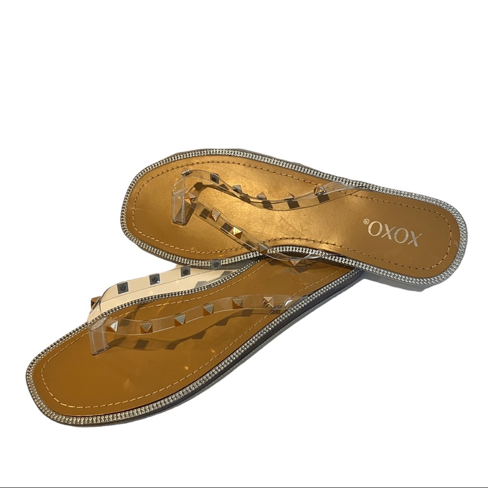 XOXO /Sandals New without tags. Straps are transparent with gold studs.